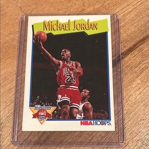 This 1991 NBA Hoops Milestones card features the legendary Michael Jordan